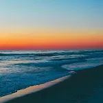 Sunset By The Sea At Fontainebleau Terrace #222 By Nautical Properties
